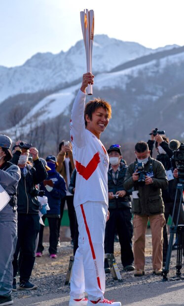 次世代育成の取り組みなどが高く評価され、東京オリンピック聖火ランナーを務めた丸山さん。